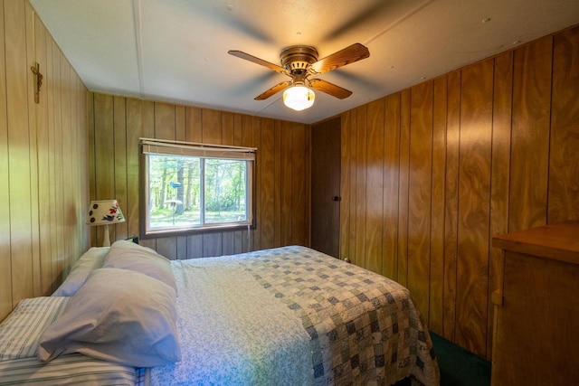W2761 49th St, Mauston, WI 53948 - bedroom with wood walls and a ceiling fan
