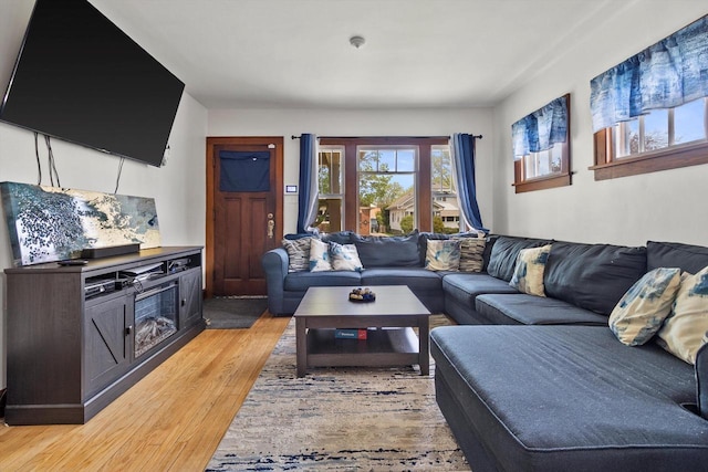 901 William St, Racine, WI 53402 - living room featuring light wood-style flooring