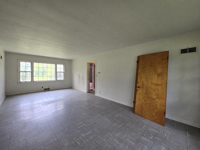 6455 N 56th St, Milwaukee, WI 53223 - spare room with baseboards