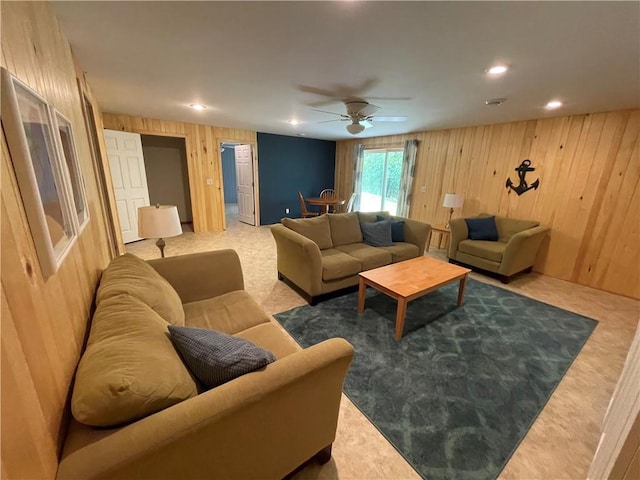 1762 Wilson Ave, Menomonie, WI 54751 - living area featuring a ceiling fan, wooden walls, and recessed lighting