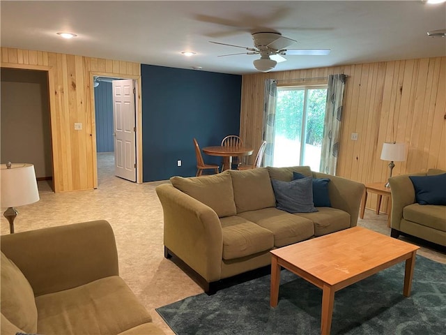 1762 Wilson Ave, Menomonie, WI 54751 - living room featuring wooden walls and a ceiling fan