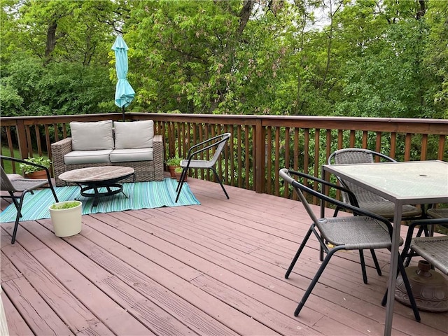1762 Wilson Ave, Menomonie, WI 54751 - wooden deck with an outdoor hangout area and outdoor dining space