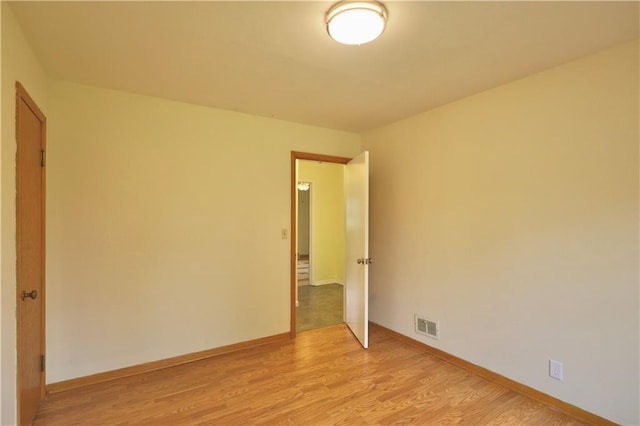 3053 Jupiter Ave, Eau Claire, WI 54703 - unfurnished room with light wood-type flooring and baseboards