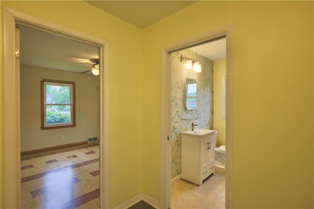 3053 Jupiter Ave, Eau Claire, WI 54703 - hall featuring a sink and baseboards