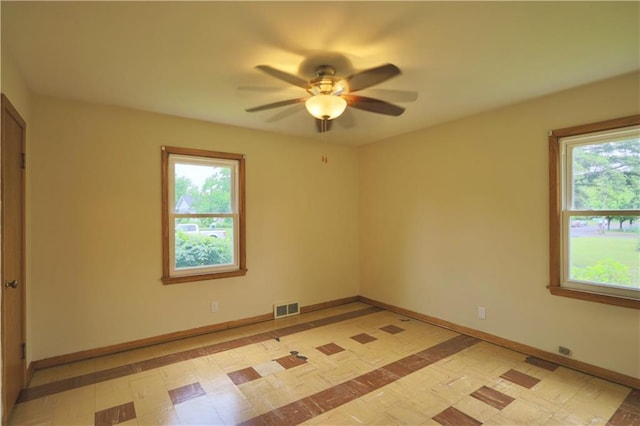 3053 Jupiter Ave, Eau Claire, WI 54703 - spare room featuring ceiling fan and baseboards