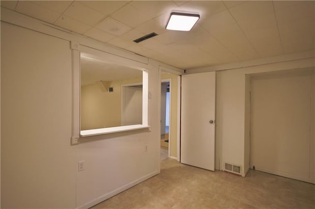 3053 Jupiter Ave, Eau Claire, WI 54703 - basement featuring a paneled ceiling