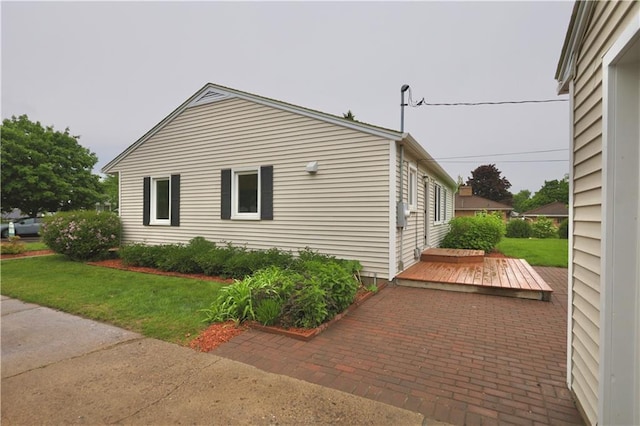 3053 Jupiter Ave, Eau Claire, WI 54703 - view of home's exterior with a lawn and a deck