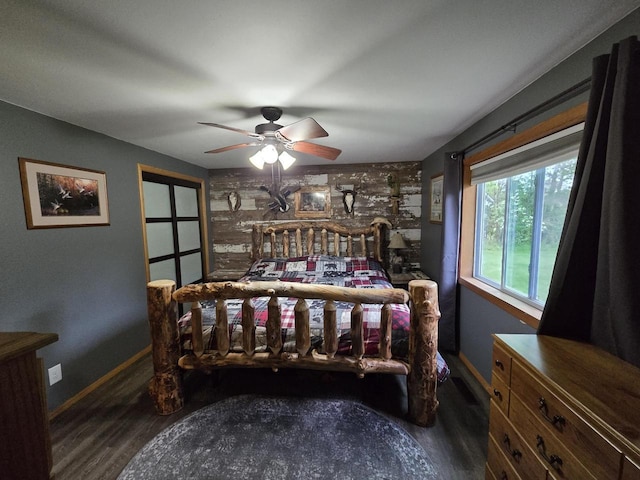 5321 Breezy Pine Dr, Wisconsin Rapids, WI 54494 - bedroom featuring wood finished floors, baseboards, and a ceiling fan