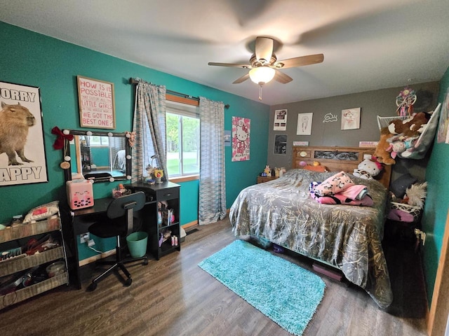 5321 Breezy Pine Dr, Wisconsin Rapids, WI 54494 - bedroom with wood finished floors and a ceiling fan