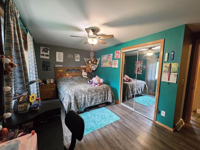 5321 Breezy Pine Dr, Wisconsin Rapids, WI 54494 - bedroom featuring wood finished floors, a closet, ceiling fan, and baseboards