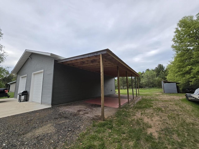 5321 Breezy Pine Dr, Wisconsin Rapids, WI 54494 - view of side of property with a garage and an outdoor structure