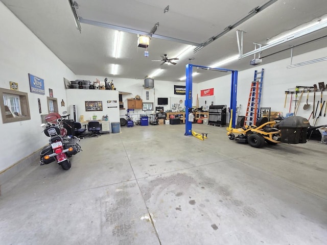 5321 Breezy Pine Dr, Wisconsin Rapids, WI 54494 - garage with a garage door opener and a workshop area