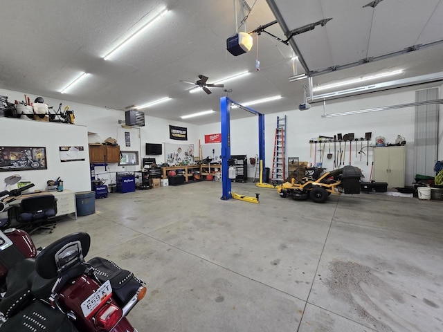 5321 Breezy Pine Dr, Wisconsin Rapids, WI 54494 - garage with a garage door opener, a workshop area, and a heating unit