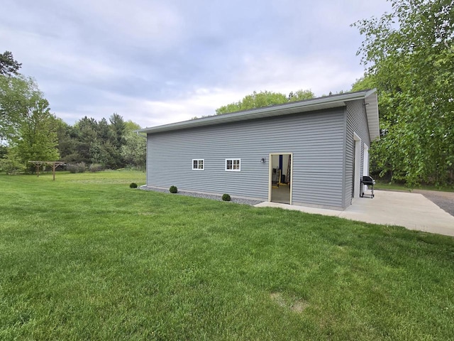 5321 Breezy Pine Dr, Wisconsin Rapids, WI 54494 - back of house with a yard and a patio area