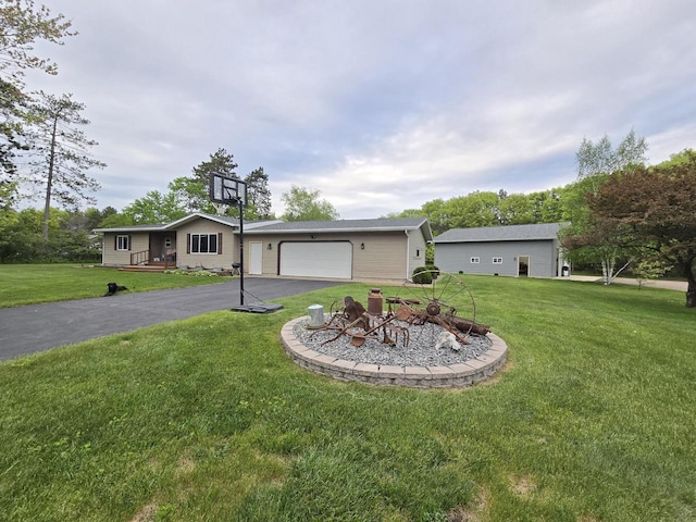 5321 Breezy Pine Dr, Wisconsin Rapids, WI 54494 - view of front of house with a front lawn and a garage