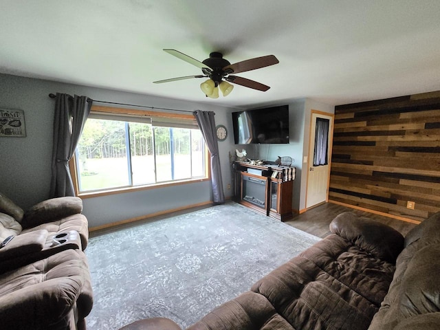 5321 Breezy Pine Dr, Wisconsin Rapids, WI 54494 - living room with a ceiling fan and baseboards