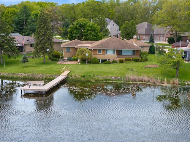 5743 Island View Ct, Waterford, WI 53185 - dock with a water view and a lawn