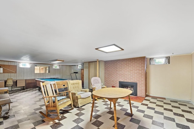 5743 Island View Ct, Waterford, WI 53185 - playroom featuring tile patterned floors, billiards, a brick fireplace, and healthy amount of natural light
