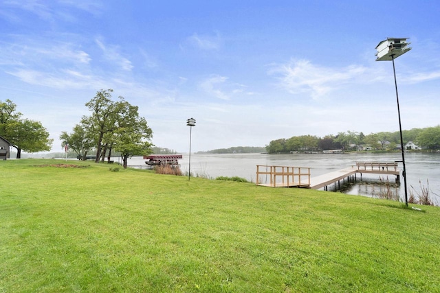 5743 Island View Ct, Waterford, WI 53185 - view of grassy yard featuring a water view and a boat dock