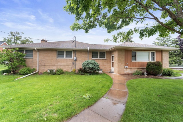 5743 Island View Ct, Waterford, WI 53185 - ranch-style house with brick siding, a front yard, and a chimney