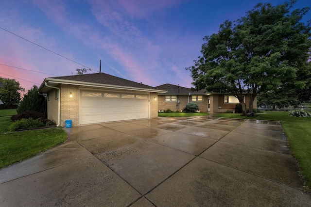 5743 Island View Ct, Waterford, WI 53185 - single story home featuring brick siding, a garage, and a front lawn