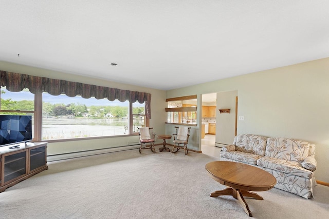 5743 Island View Ct, Waterford, WI 53185 - carpeted living room featuring a baseboard radiator