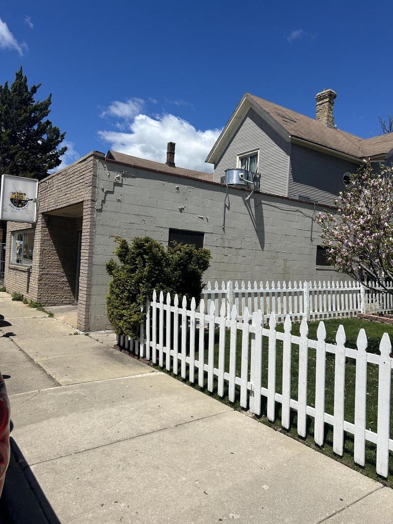 1642 Washington Ave, Racine, WI 53403 - view of home's exterior featuring a chimney