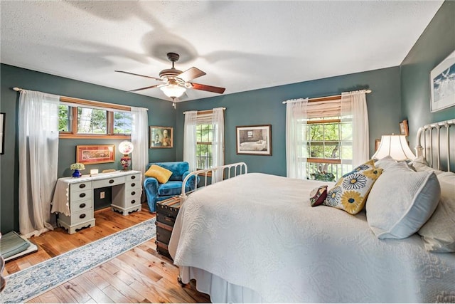 2322 243rd Ave, Cushing, WI 54006 - bedroom featuring light wood-type flooring and a ceiling fan