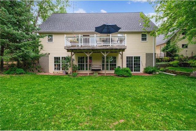 2322 243rd Ave, Cushing, WI 54006 - back of property with a yard, a patio area, and a wooden deck