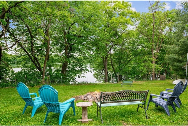 2322 243rd Ave, Cushing, WI 54006 - view of green lawn featuring a fire pit
