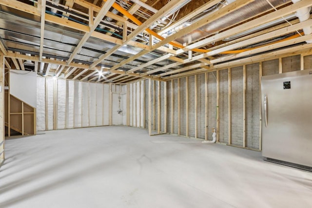 1766 Derby Ln, Oconomowoc, WI 53066 - unfinished basement with freestanding refrigerator