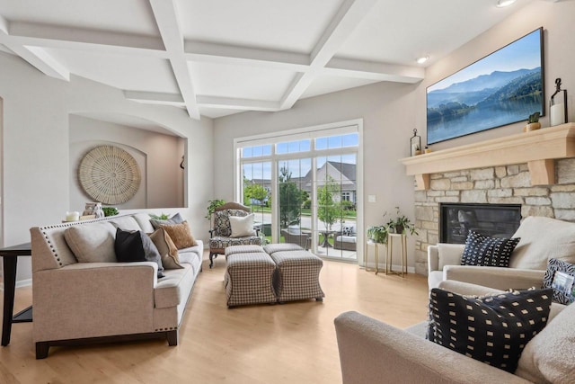 1766 Derby Ln, Oconomowoc, WI 53066 - living room with coffered ceiling, wood finished floors, beamed ceiling, a fireplace, and recessed lighting