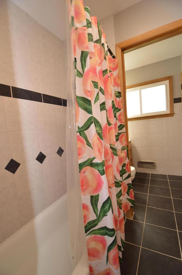 1781 Spruce Ct, South Milwaukee, WI 53172 - bathroom featuring tile patterned floors and shower / bath combo