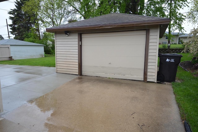 1781 Spruce Ct, South Milwaukee, WI 53172 - detached garage featuring concrete driveway