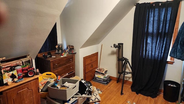 2126 S 16th St, Sheboygan, WI 53081 - bedroom with light wood finished floors and lofted ceiling