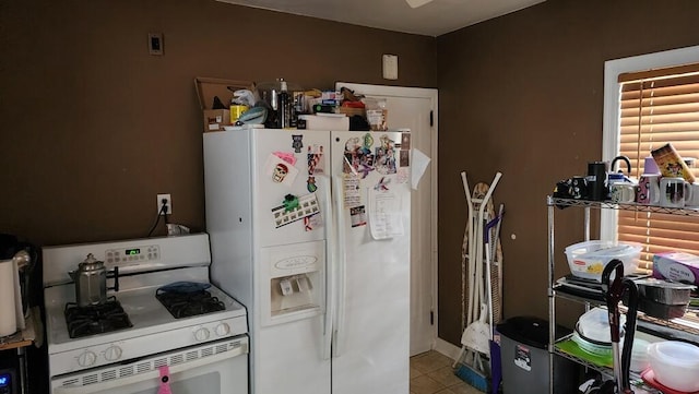 2126 S 16th St, Sheboygan, WI 53081 - kitchen featuring white appliances and tile patterned flooring