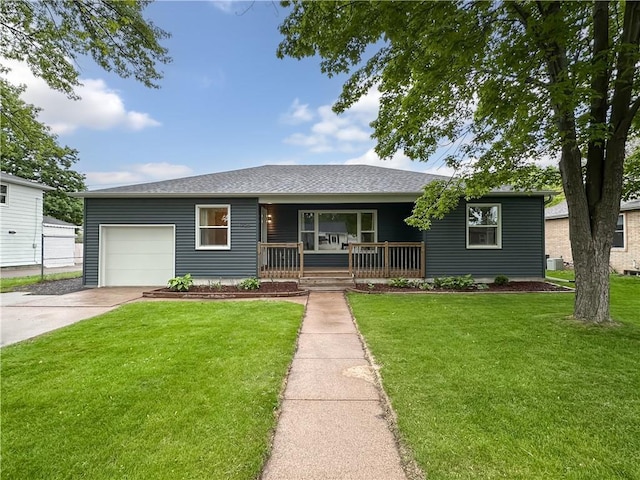 1708 Rist Ave, Eau Claire, WI 54701 - ranch-style home featuring a porch, concrete driveway, a front lawn, and a garage