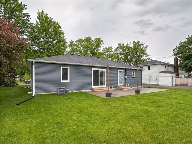 1708 Rist Ave, Eau Claire, WI 54701 - back of house featuring entry steps and a patio area