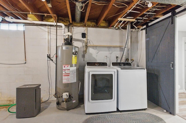 106 Elm St, Westby, WI 54667 - laundry area featuring water heater and washer and dryer