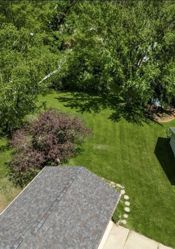 106 Elm St, Westby, WI 54667 - view of grassy yard featuring a patio area