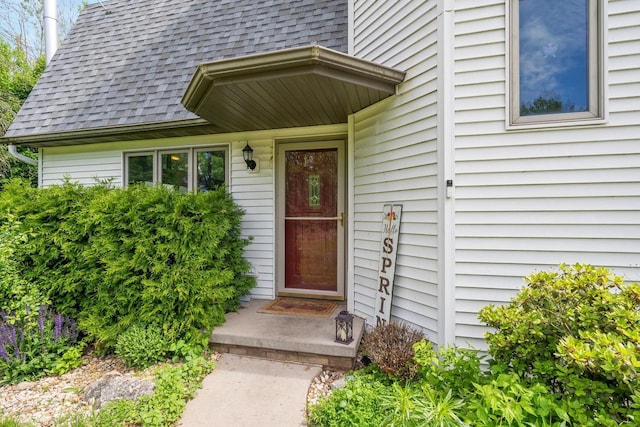 7459 Jensen Rd, Oshkosh, WI 54904 - doorway to property featuring roof with shingles