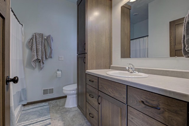 N406 Marion Ave, Appleton, WI 54915 - bathroom featuring toilet, vanity, and baseboards