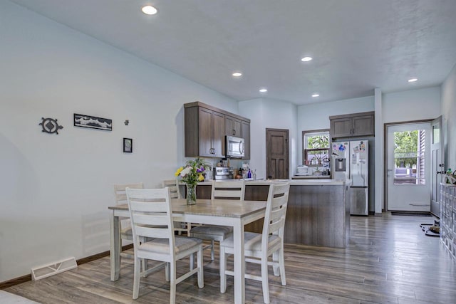 N406 Marion Ave, Appleton, WI 54915 - dining area with wood finished floors, recessed lighting, and baseboards
