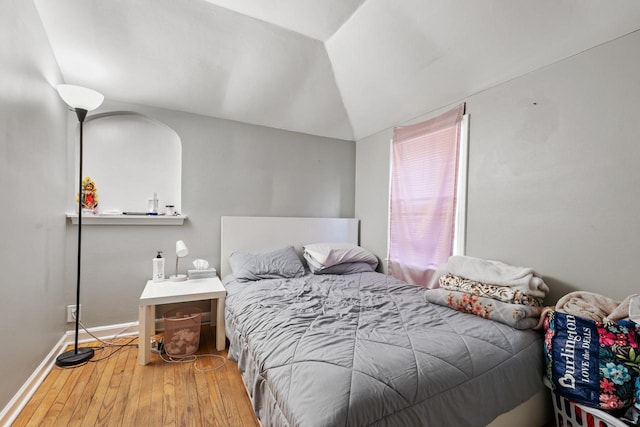 4131 N 41st St, Milwaukee, WI 53216 - bedroom featuring hardwood / wood-style floors, vaulted ceiling, and baseboards