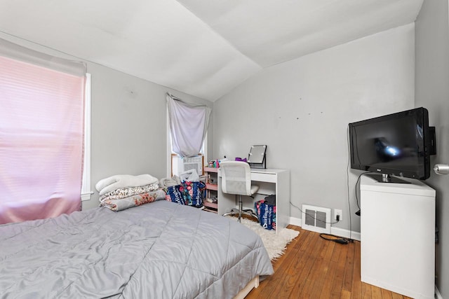4131 N 41st St, Milwaukee, WI 53216 - bedroom with lofted ceiling, hardwood / wood-style floors, and baseboards