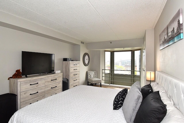 270 E Highland Ave Unit 644, Milwaukee, WI 53202 - bedroom with a textured ceiling