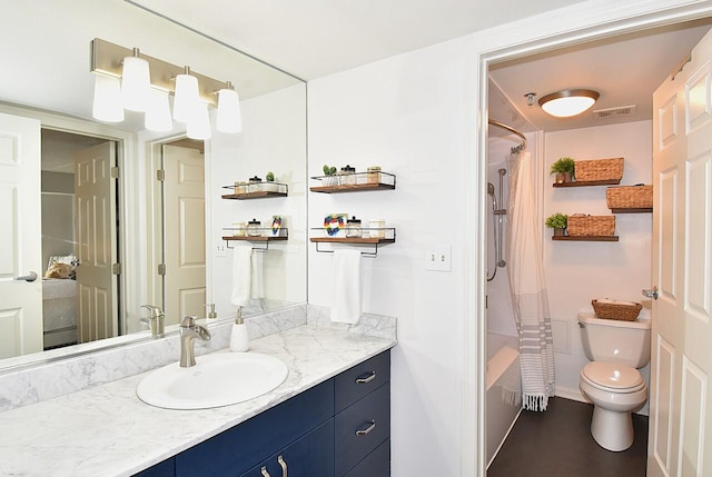 270 E Highland Ave Unit 644, Milwaukee, WI 53202 - bathroom featuring vanity, toilet, and shower / tub combo with curtain