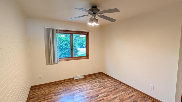 N8292 Deadwood Point Rd, Fond Du Lac, WI 54937 - unfurnished room with wood finished floors, a ceiling fan, and baseboards