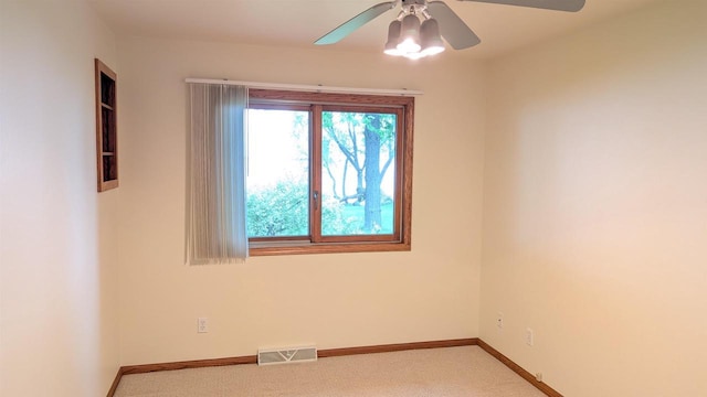 N8292 Deadwood Point Rd, Fond Du Lac, WI 54937 - empty room featuring ceiling fan, light carpet, and baseboards