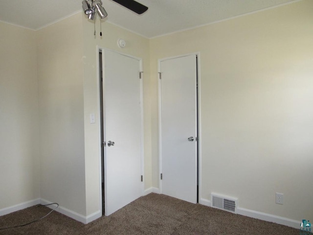 701 N 22nd St, Superior, WI 54880 - unfurnished bedroom with carpet, crown molding, and baseboards